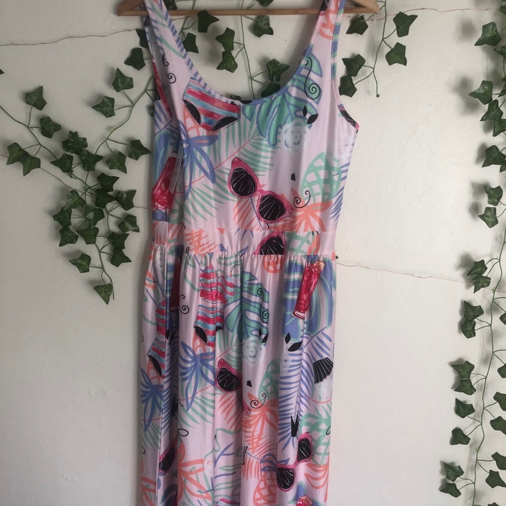 long dress with summer design throughout it